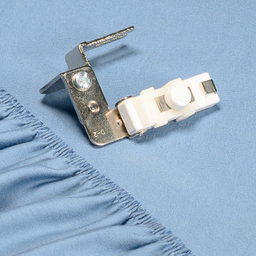 Elastic gathering attachment